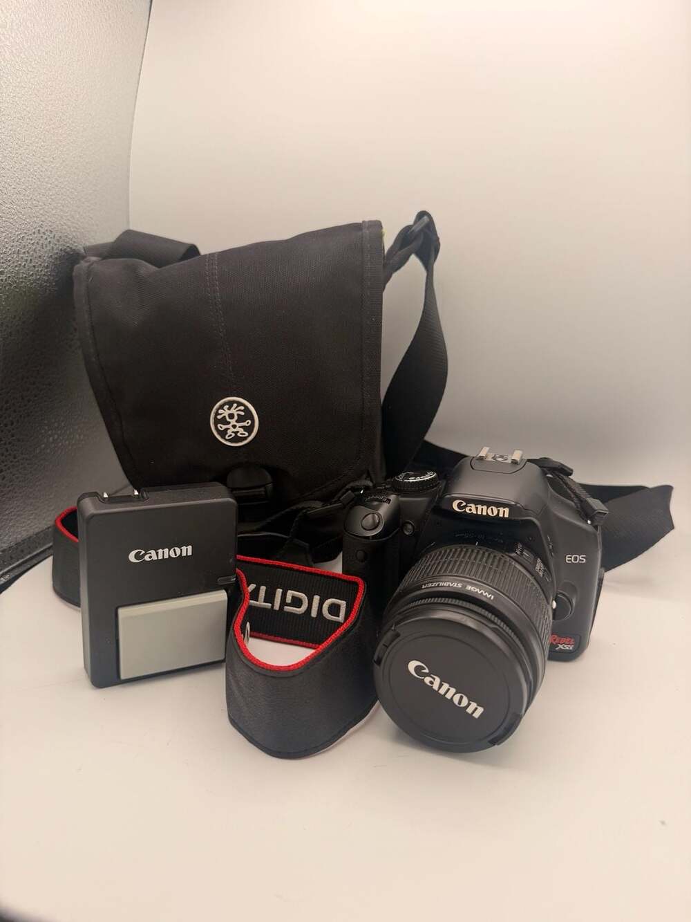 Canon EOS Digital Rebel XSi DSLR Camera with EF-S 18-55mm IS Lens Bundle